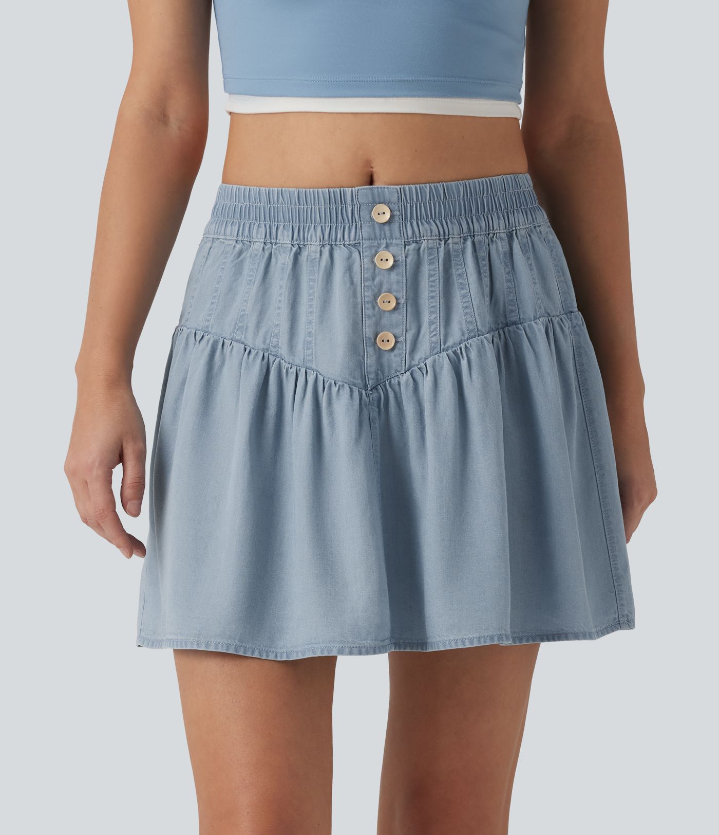 Drapierter Minirock aus Lyocell-Denim mit mittlerer Bundhöhe, lässiger A-Linien-Schnitt Drapierter Minirock aus Lyocell-Denim mit mittlerer Bundhöhe, lässiger A-Linien-Schnitt