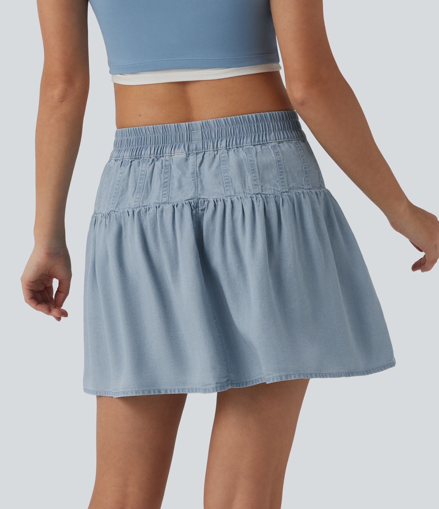 Drapierter Minirock aus Lyocell-Denim mit mittlerer Bundhöhe, lässiger A-Linien-Schnitt Drapierter Minirock aus Lyocell-Denim mit mittlerer Bundhöhe, lässiger A-Linien-Schnitt