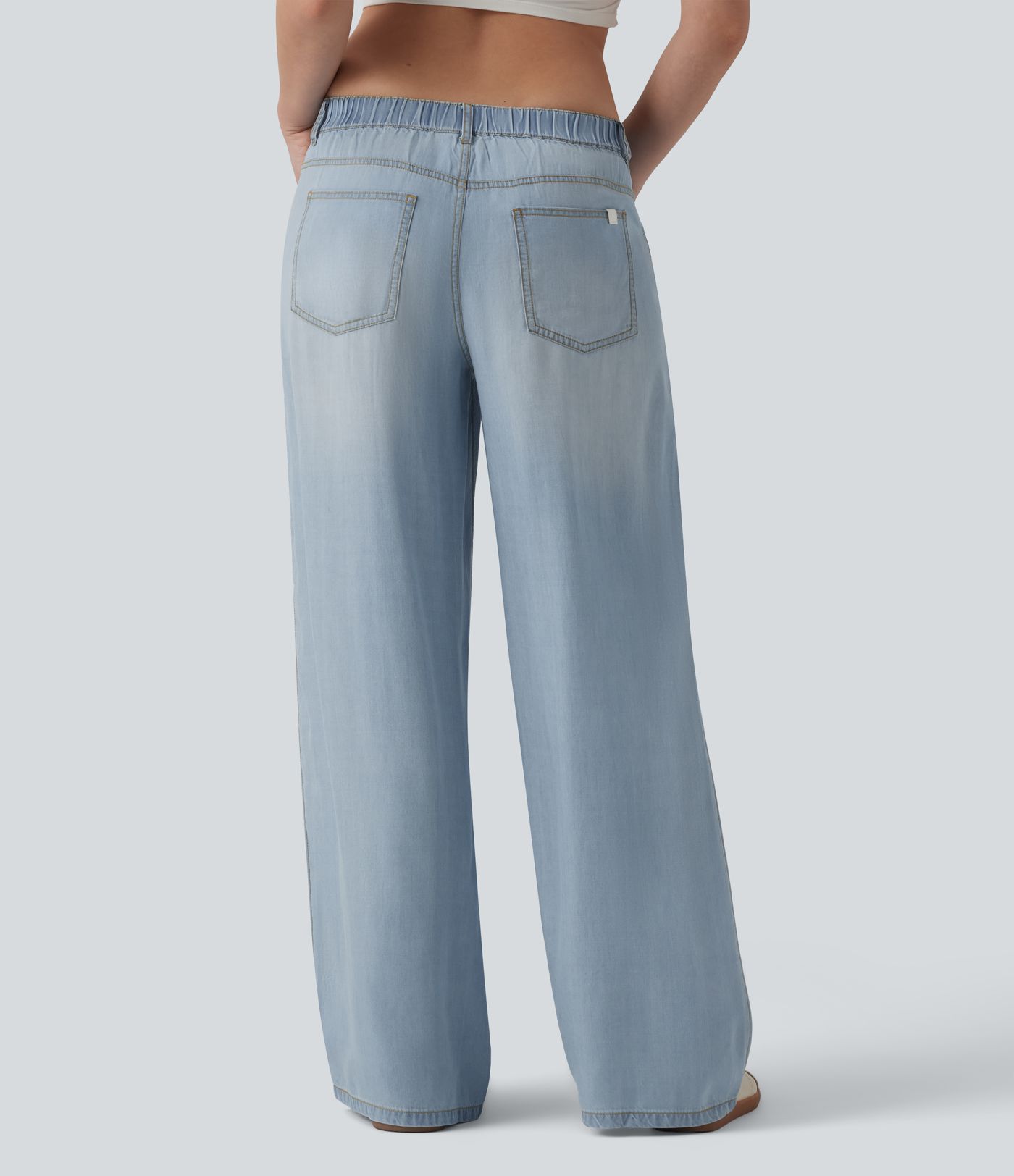 Jean large drapé taille basse avec poches