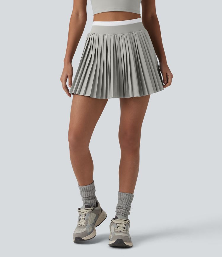 Jupe mini de tennis plissée 2-en-1 Breezeful™ color block taille haute à séchage rapide avec poches