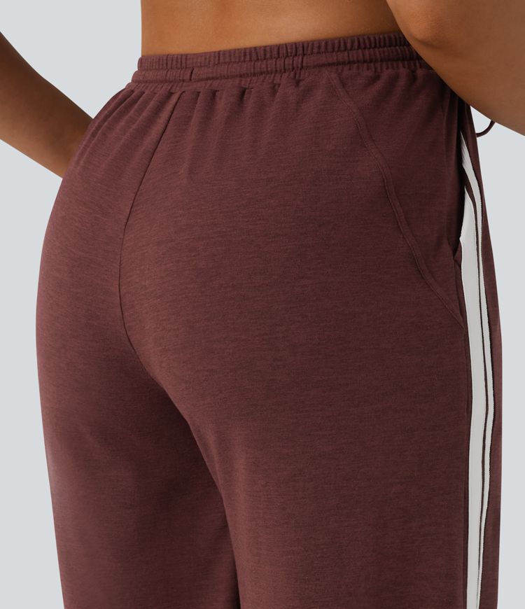 Lässige Baggy-Hose mit hohem Bund, Seitentaschen, Kordelzug, Streifen und Farbblock