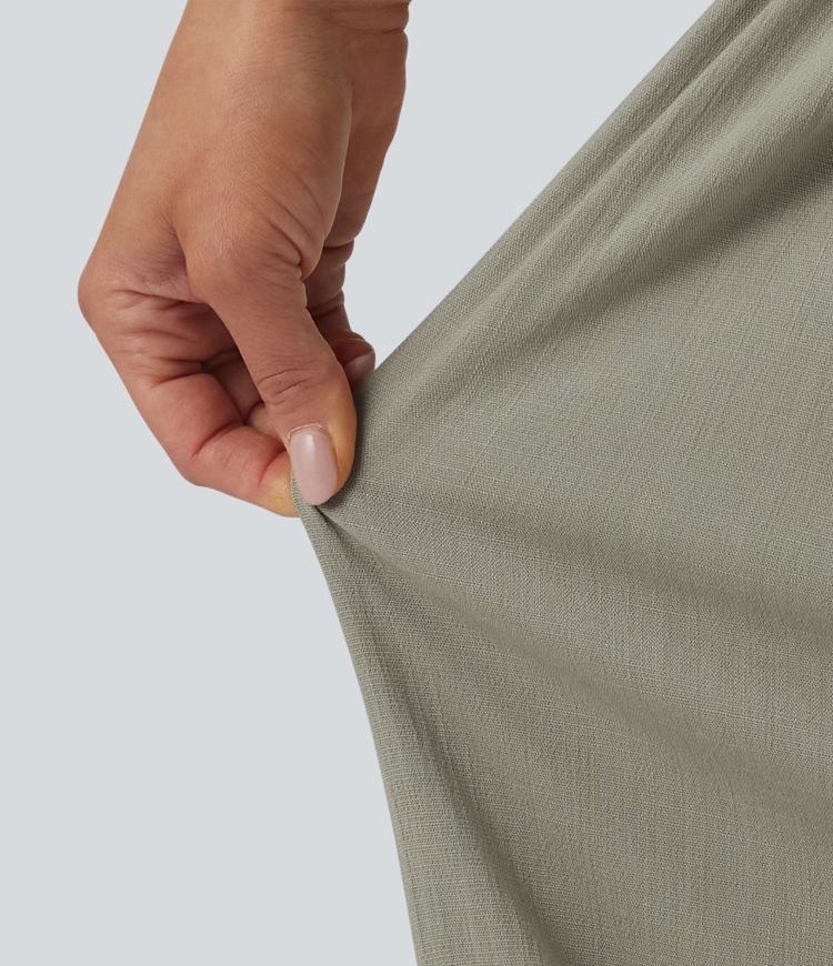 Wide-leg, flowing, mid-rise linen-look trousers with belt and pockets