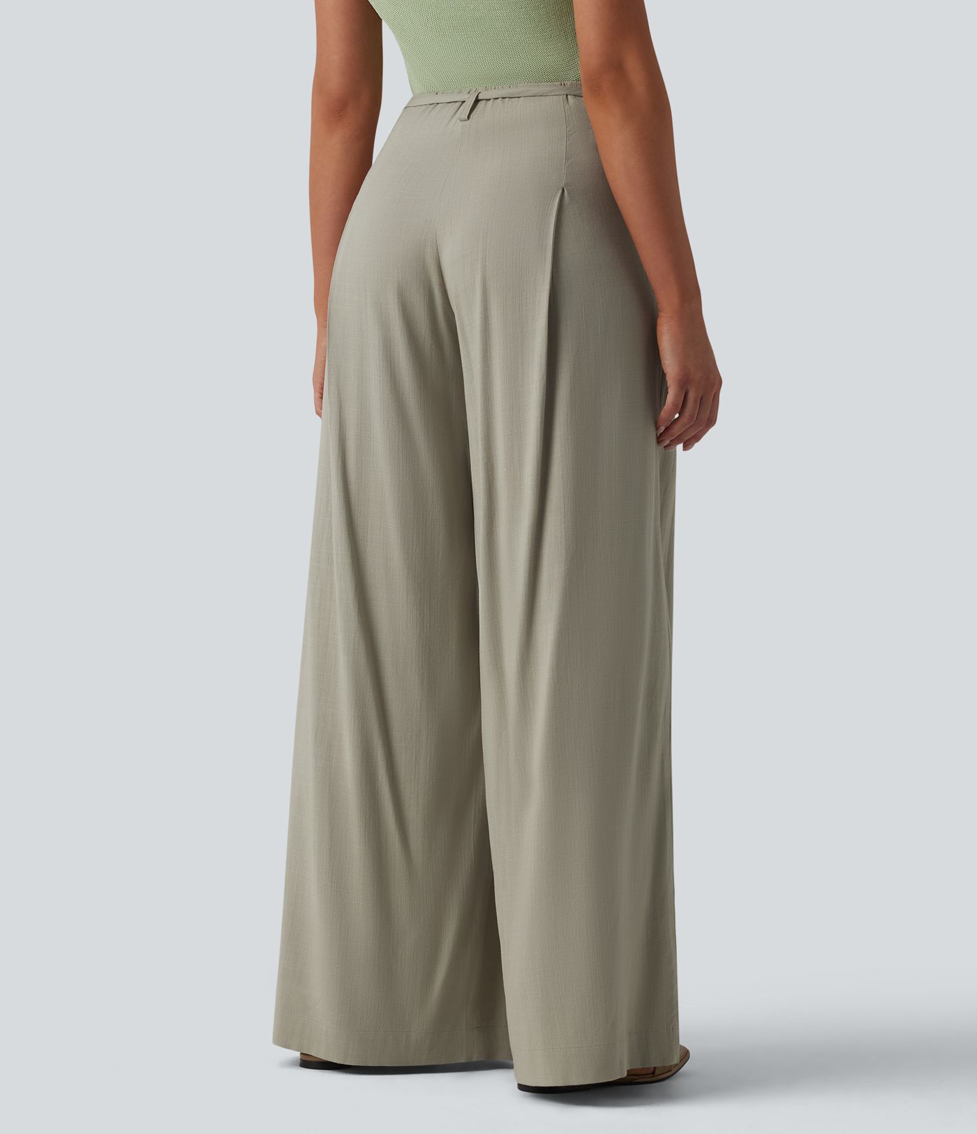 Wide-leg, flowing, mid-rise linen-look trousers with belt and pockets