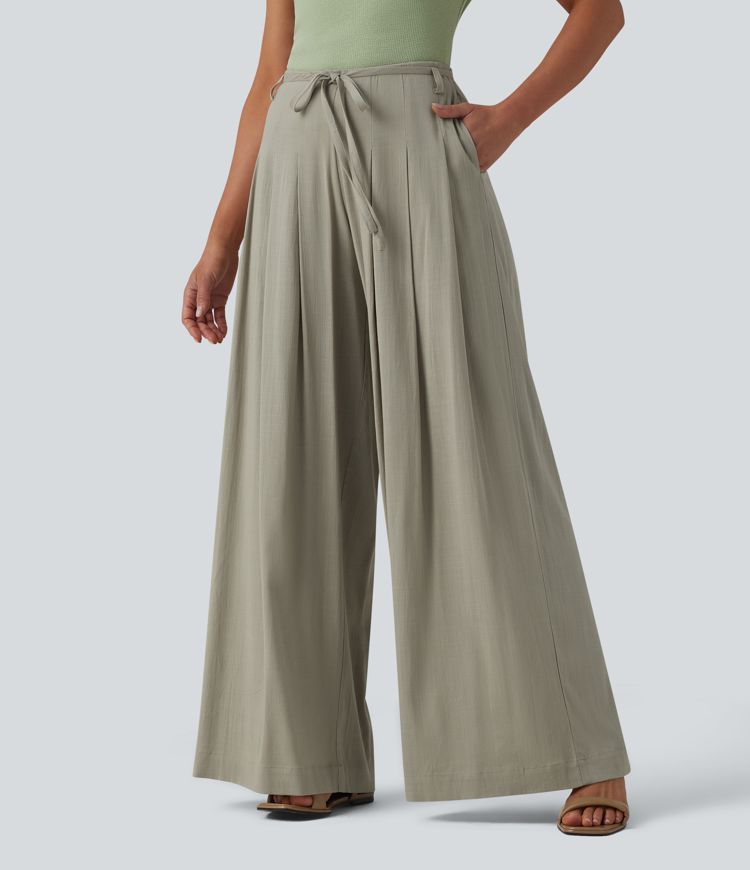 Wide-leg, flowing, mid-rise linen-look trousers with belt and pockets
