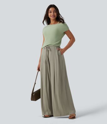 Wide-leg, flowing, mid-rise linen-look trousers with belt and pockets