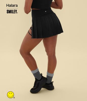 Halara X Smiley® Breezeful™ High Waisted Pleated 2-in-1 Asymmetric Hem Quick Dry Mini Dance Skirt with Pockets