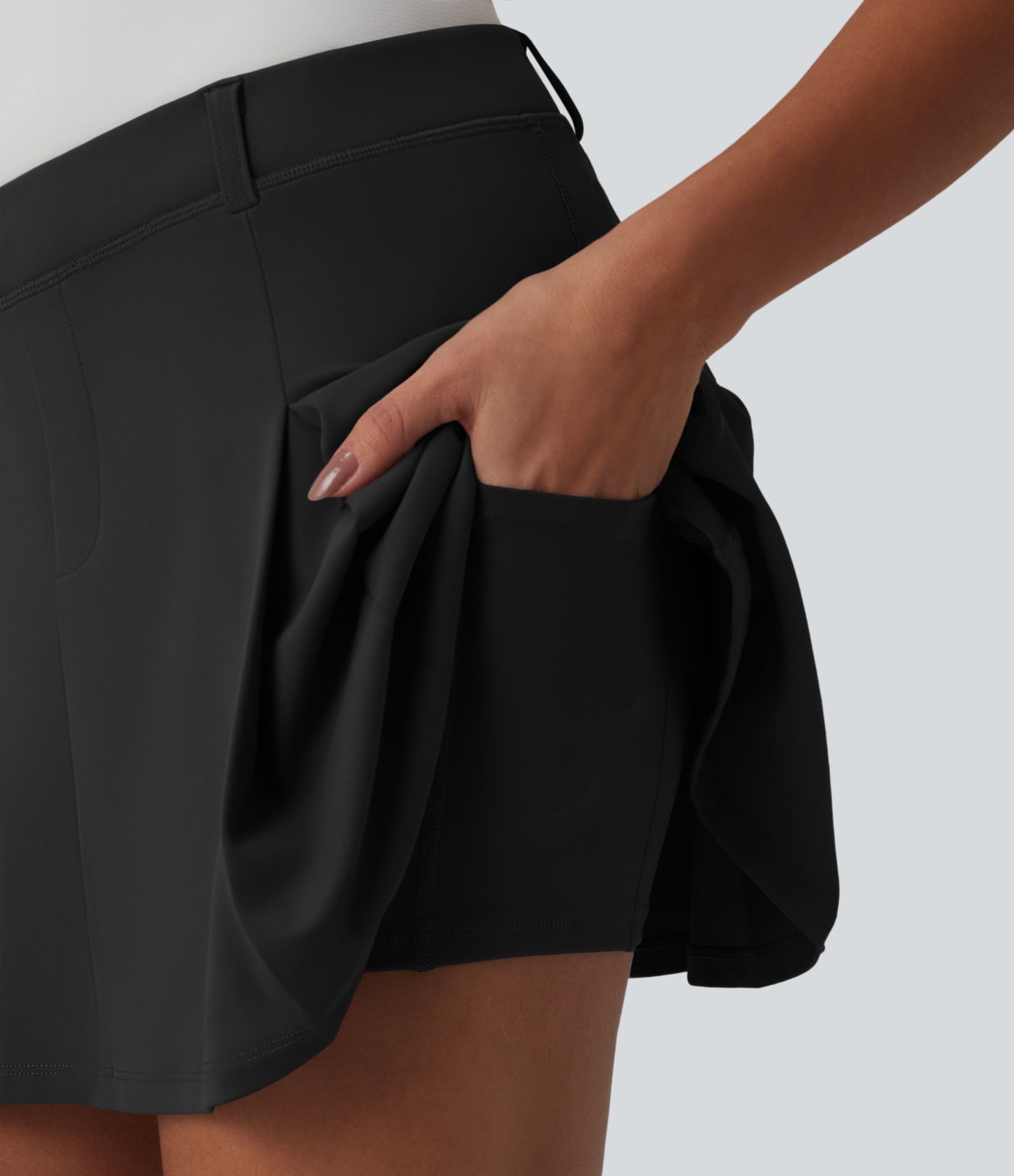 DayStretch Asymmetric Mid Rise 2-in-1 Pleated Mini Golf Skirt with Pockets