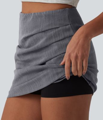 Figurbetonter, geraffter Minirock in Leinenoptik mit hohem Bund, verstecktem Reißverschluss und überkreuztem Saum Figurbetonter, geraffter Minirock in Leinenoptik mit hohem Bund, verstecktem Reißverschluss und überkreuztem Saum