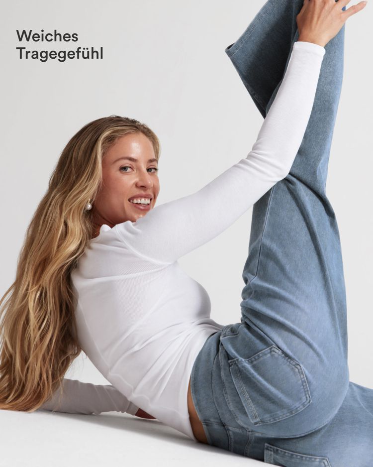 Halara Flex™ casual baggy trousers made from stretchy knit denim with a mid-rise waist, cargo side pockets and a straight leg