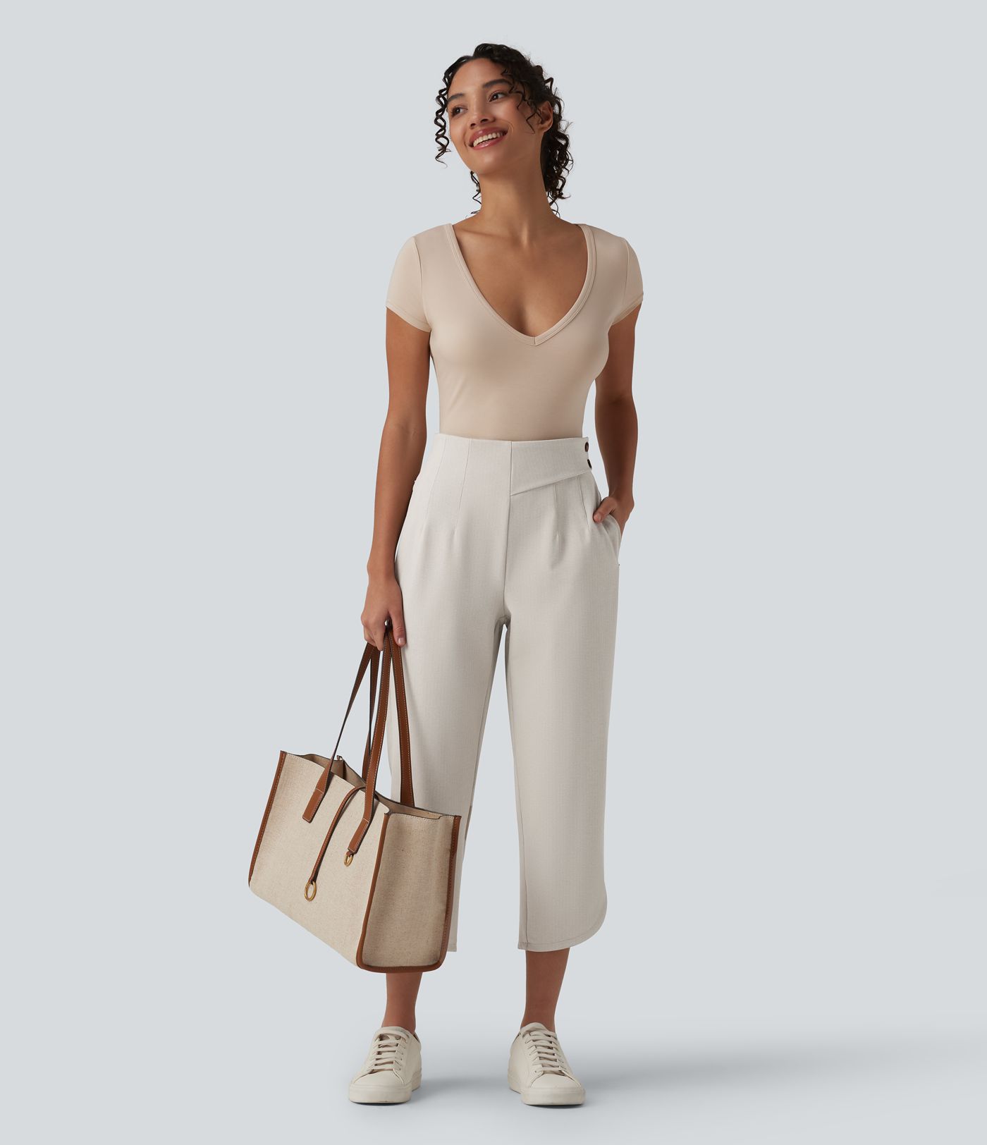 Halara Flex™ Pantalones cropped de trabajo de talle alto, corte entallado, dobladillo curvo y tejido espiga, con bolsillos.