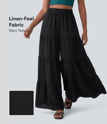Pantalon taille haute à jambe large et fluide, effet lin, avec poches