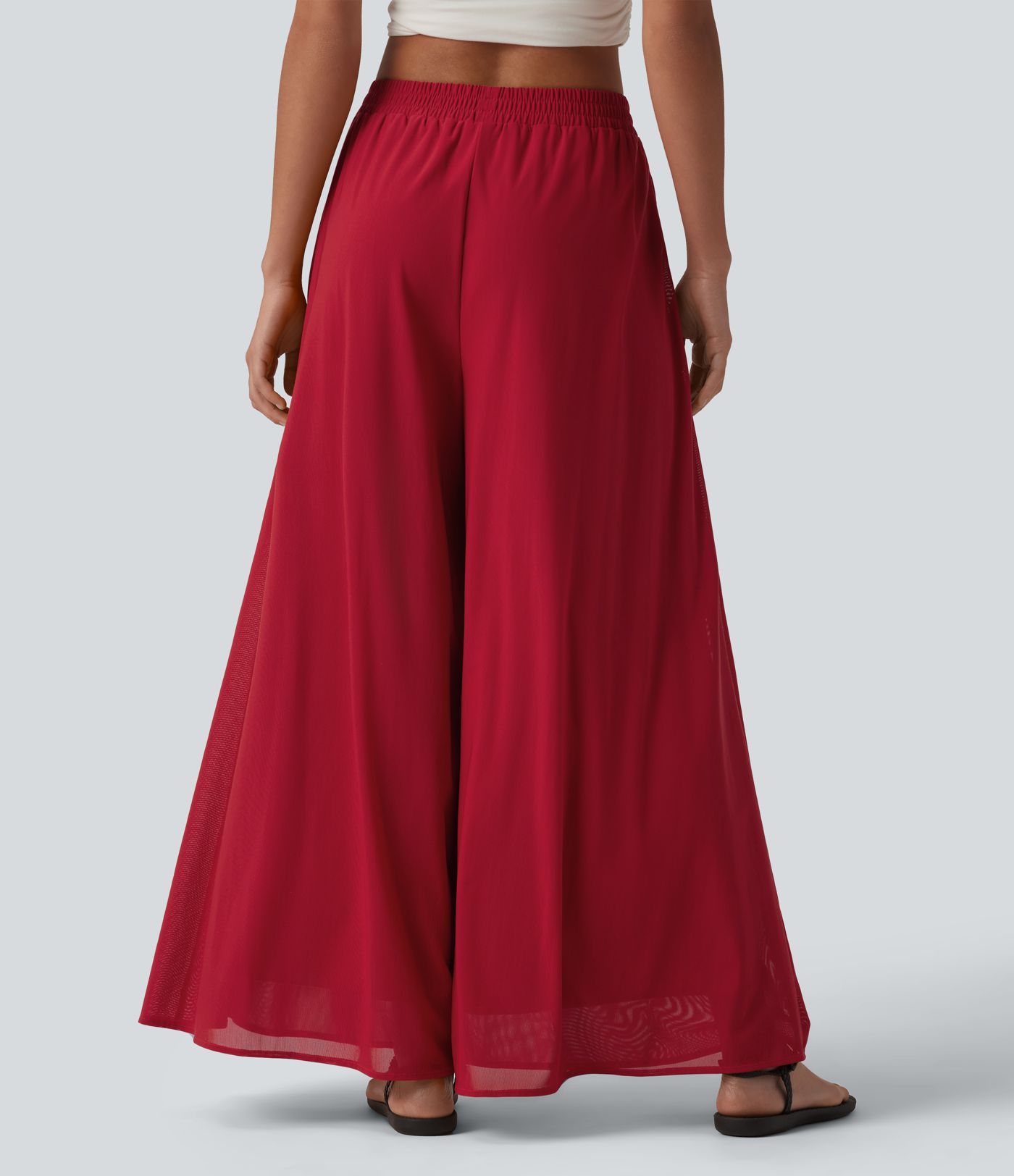 Pantalon fluide et ample avec superposition en mesh, poches latérales et taille haute