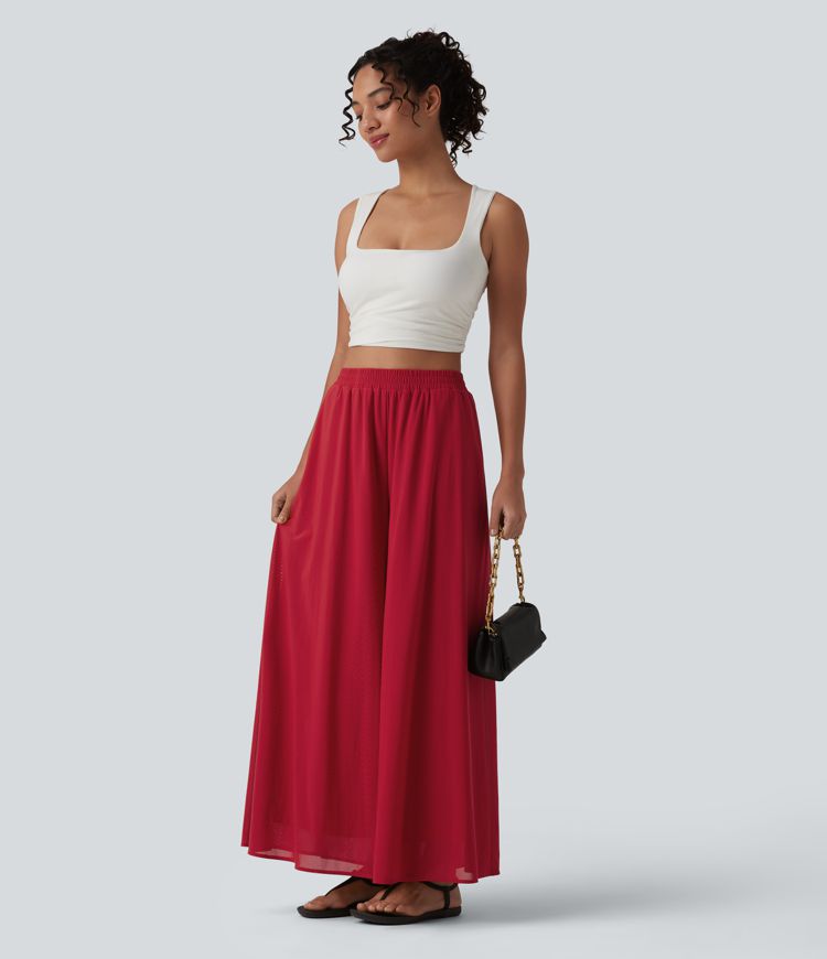 Pantalon fluide et ample avec superposition en mesh, poches latérales et taille haute