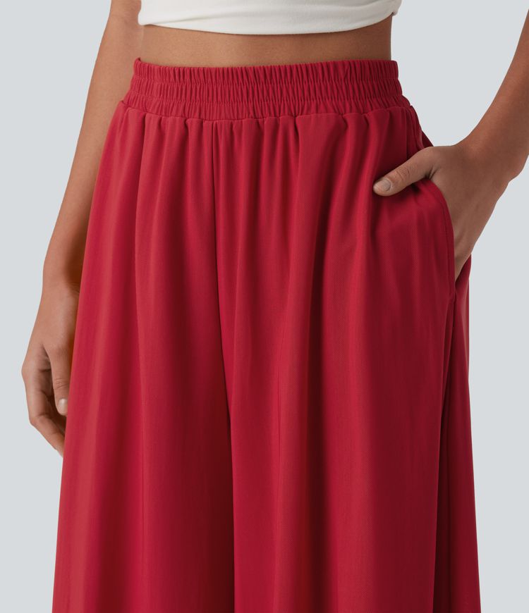 Pantalon fluide et ample avec superposition en mesh, poches latérales et taille haute