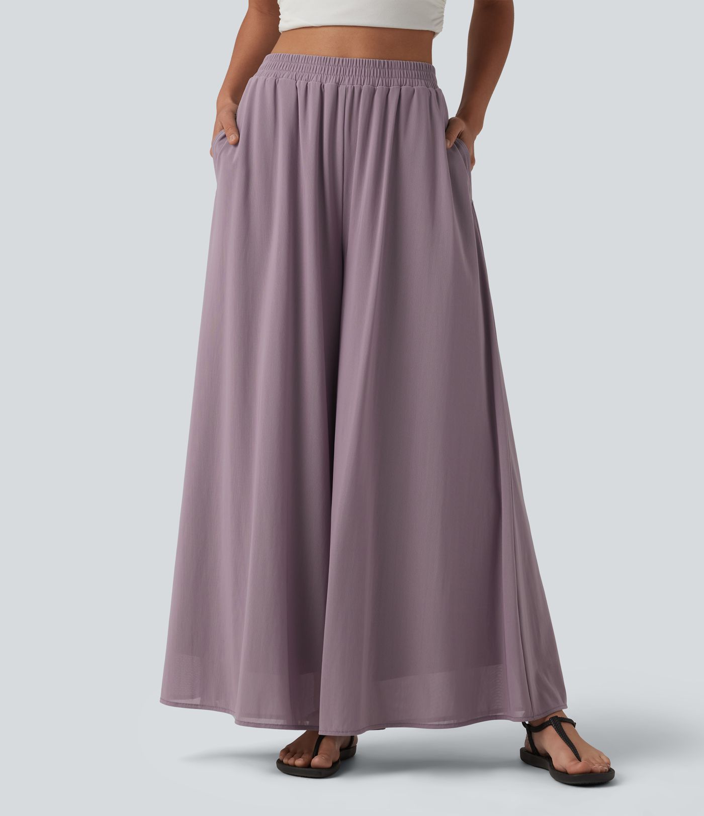 Pantalon fluide et ample avec superposition en mesh, poches latérales et taille haute