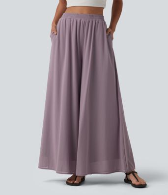 Pantalon fluide et ample avec superposition en mesh, poches latérales et taille haute