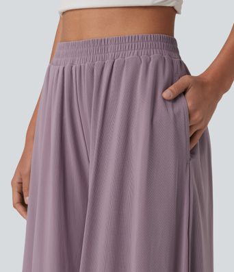 Pantalon fluide et ample avec superposition en mesh, poches latérales et taille haute