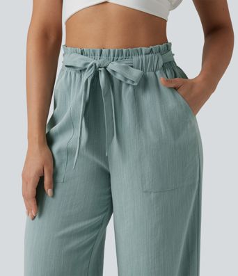 Lässige Hose in Leinenoptik mit hohem Bund, Seitentaschen, Gürtel, Rüschensaum und geradem Bein