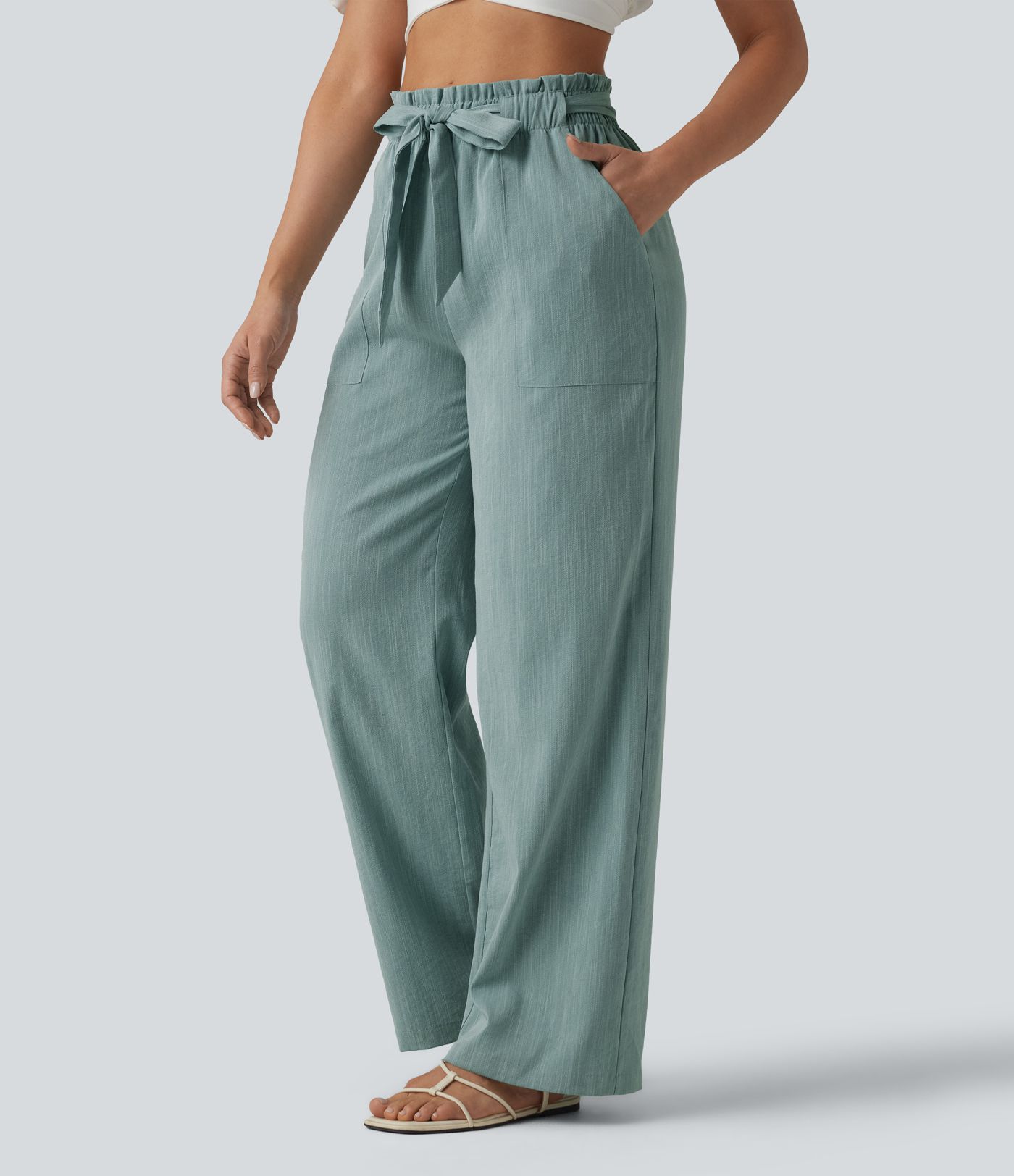Lässige Hose in Leinenoptik mit hohem Bund, Seitentaschen, Gürtel, Rüschensaum und geradem Bein