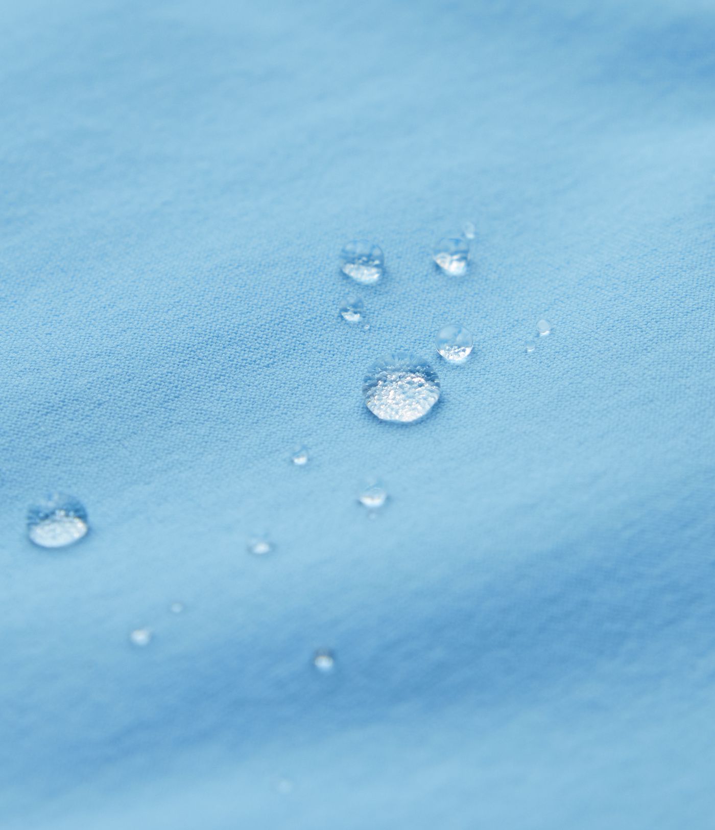 Veste de sport déperlante à capuche amovible avec cordon de serrage et poches zippées