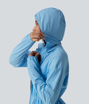 Veste de sport déperlante à capuche amovible avec cordon de serrage et poches zippées