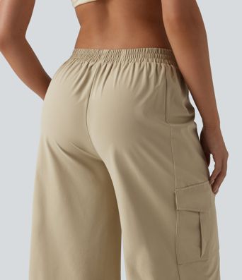 Casual cargo pants in stretch poplin, mid-rise waist, wide leg with pockets
