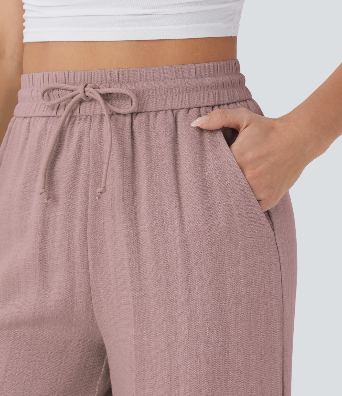 Casual trousers with a linen feel, high waist, drawstring at the side and wide leg