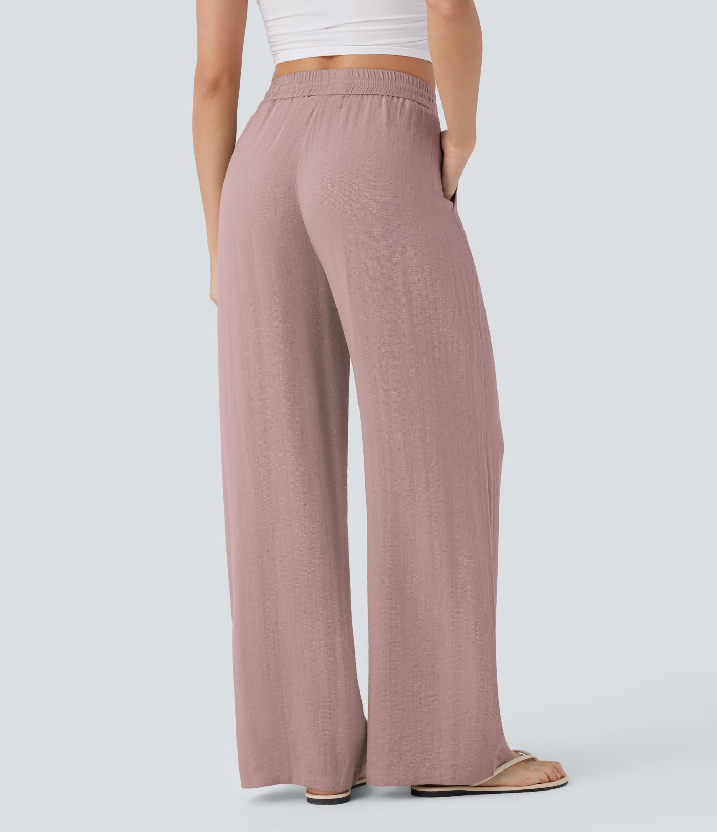Casual trousers with a linen feel, high waist, drawstring at the side and wide leg