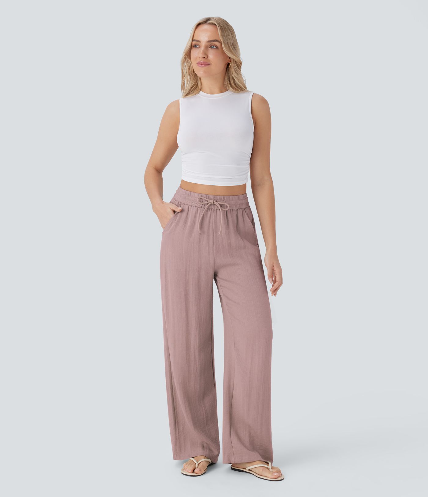 Casual trousers with a linen feel, high waist, drawstring at the side and wide leg