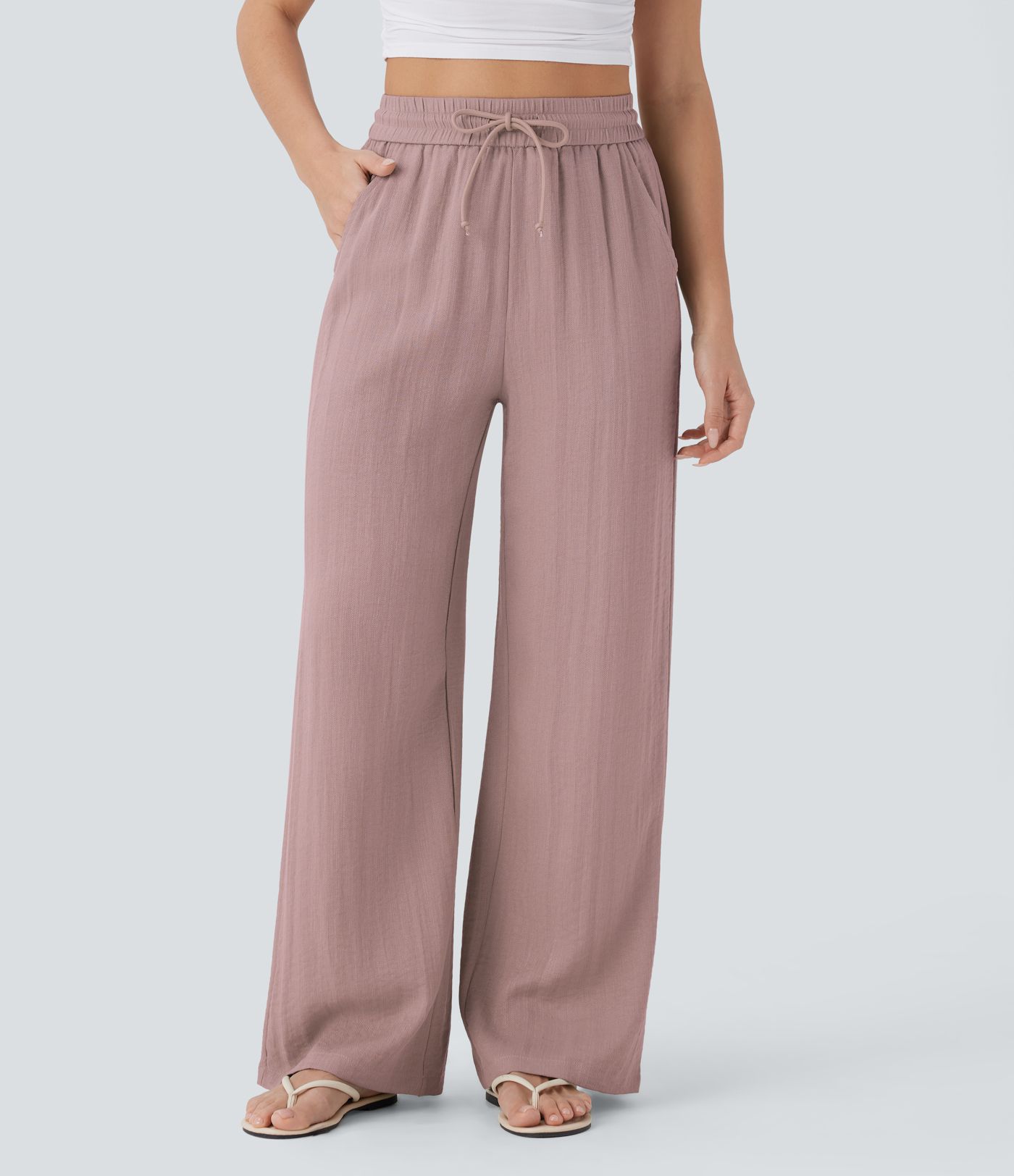 Casual trousers with a linen feel, high waist, drawstring at the side and wide leg