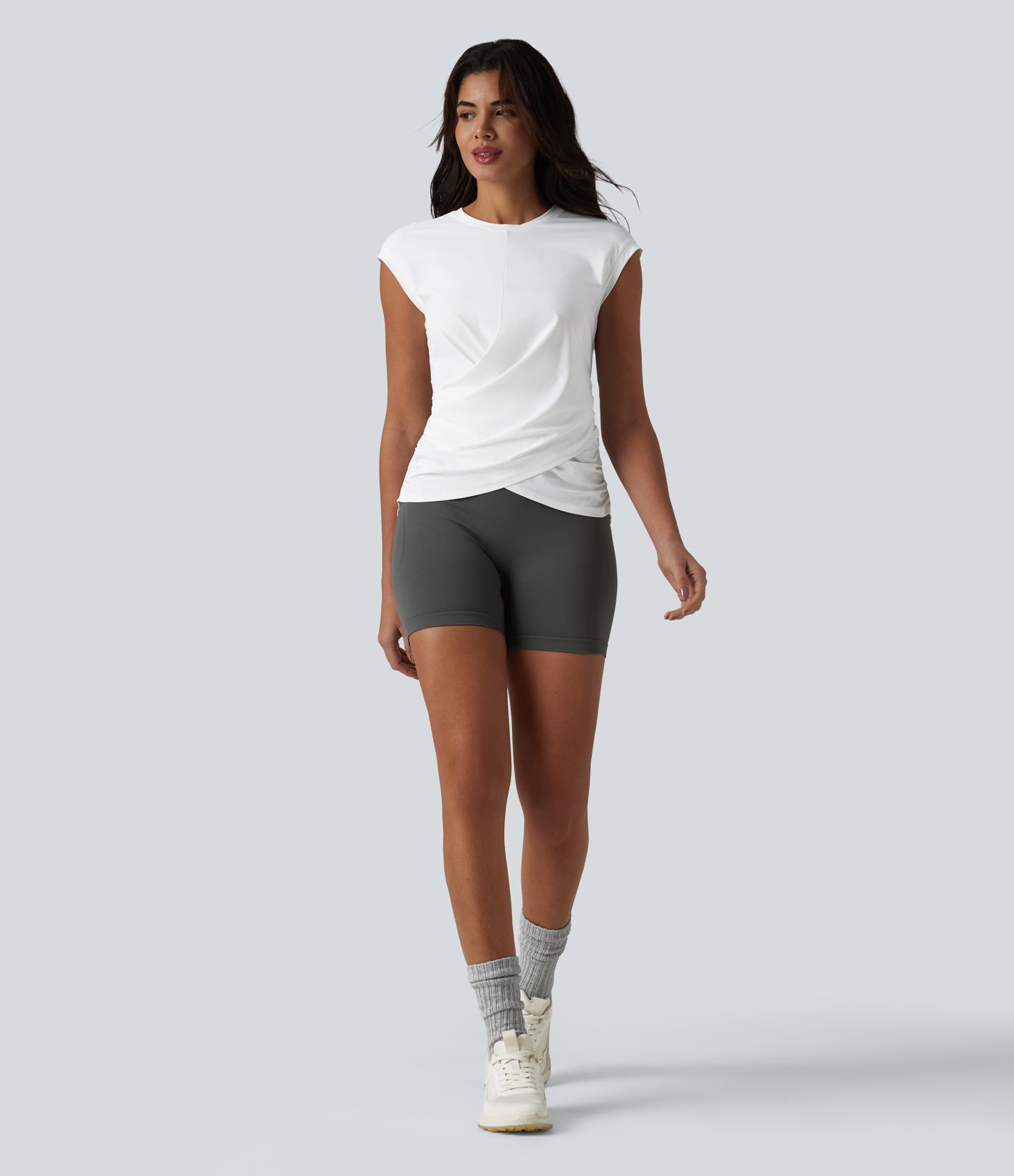 Haut de sport running col rond manches courtes ourlet croisé toucher frais séchage rapide UPF50+