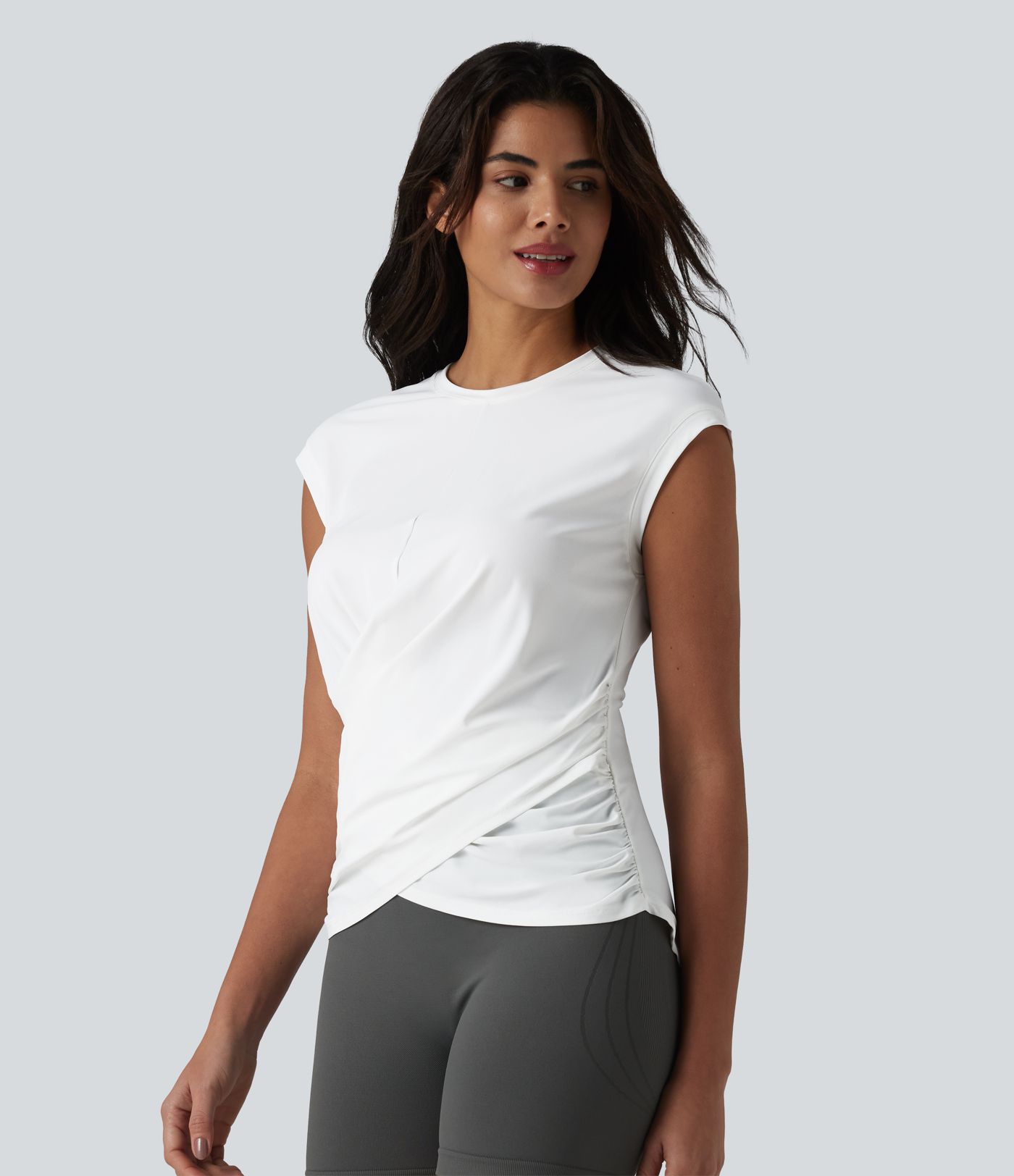 Haut de sport running col rond manches courtes ourlet croisé toucher frais séchage rapide UPF50+