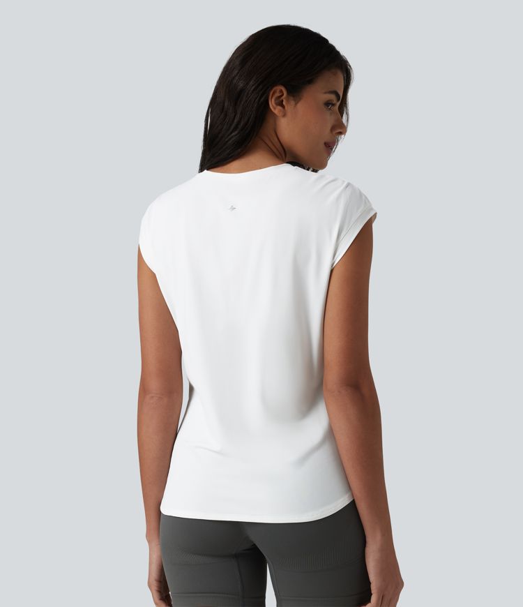 Haut de sport running col rond manches courtes ourlet croisé toucher frais séchage rapide UPF50+