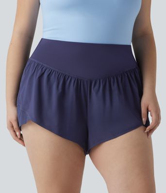 Pantalones cortos de yoga Plus Size Breezeful™ con cintura alta, bolsillo en la cintura y dobladillo cruzado - de secado rápido