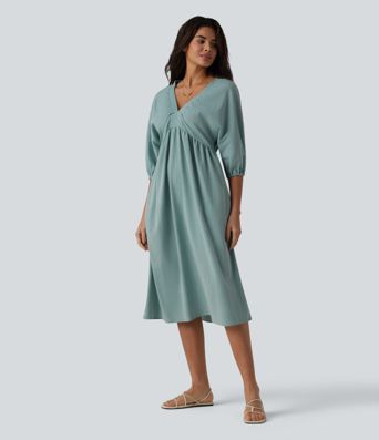 Robe mi-longue décontractée à col en V et manches 3/4, effet lin, avec poches.