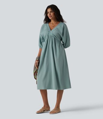 Robe mi-longue décontractée à col en V et manches 3/4, effet lin, avec poches.