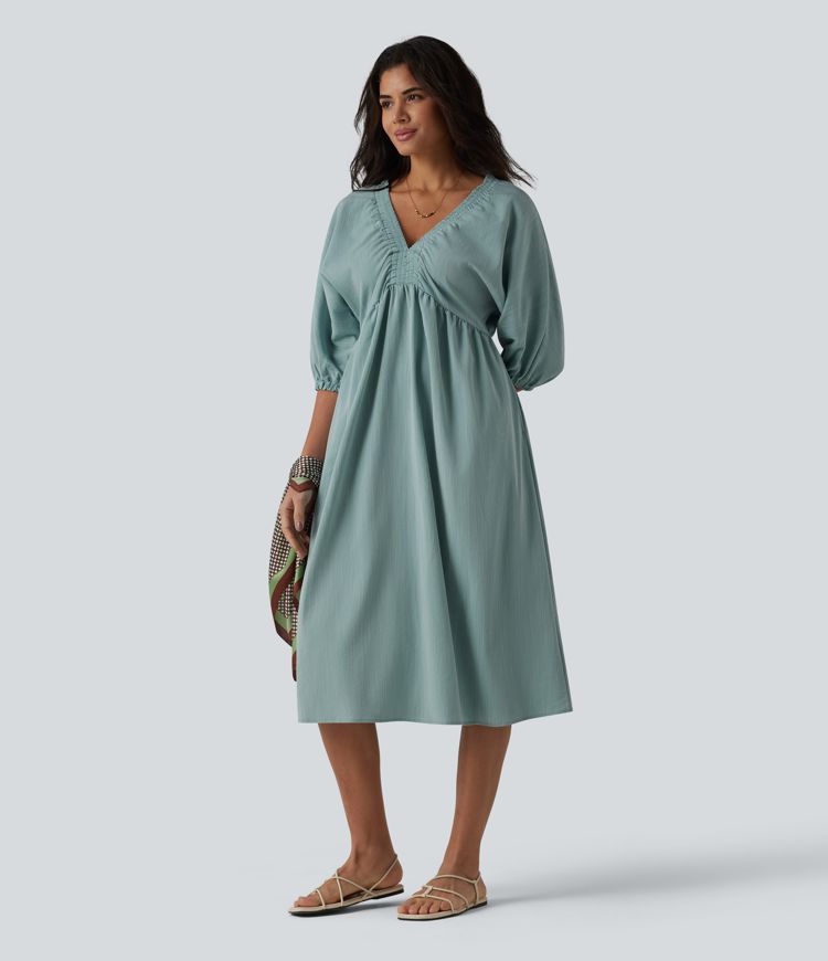 Robe mi-longue décontractée à col en V et manches 3/4, effet lin, avec poches.