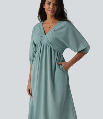 Robe mi-longue décontractée à col en V et manches 3/4, effet lin, avec poches.