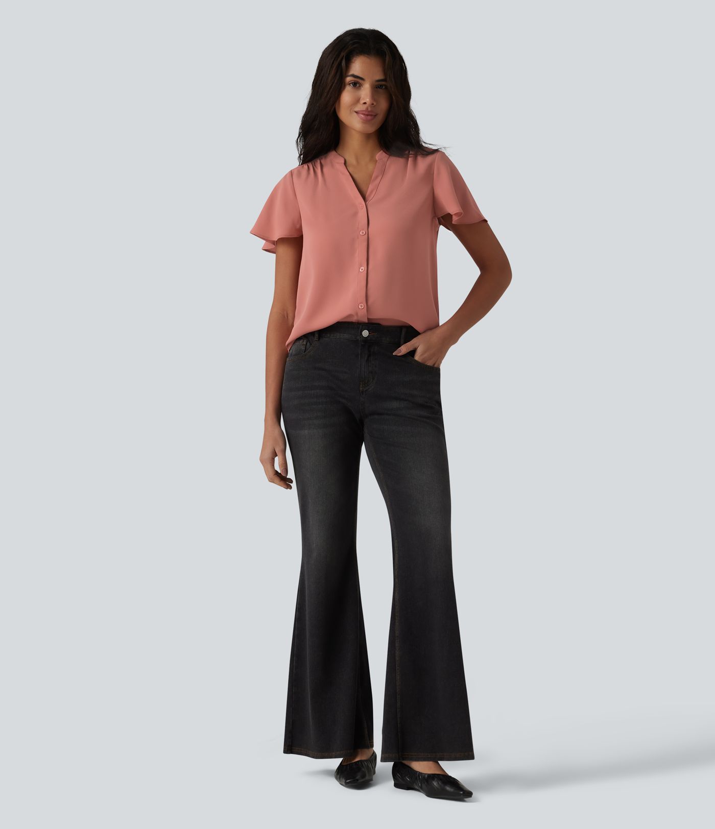 Casual blouse with a V-neck, flounced sleeves and a rounded hem.