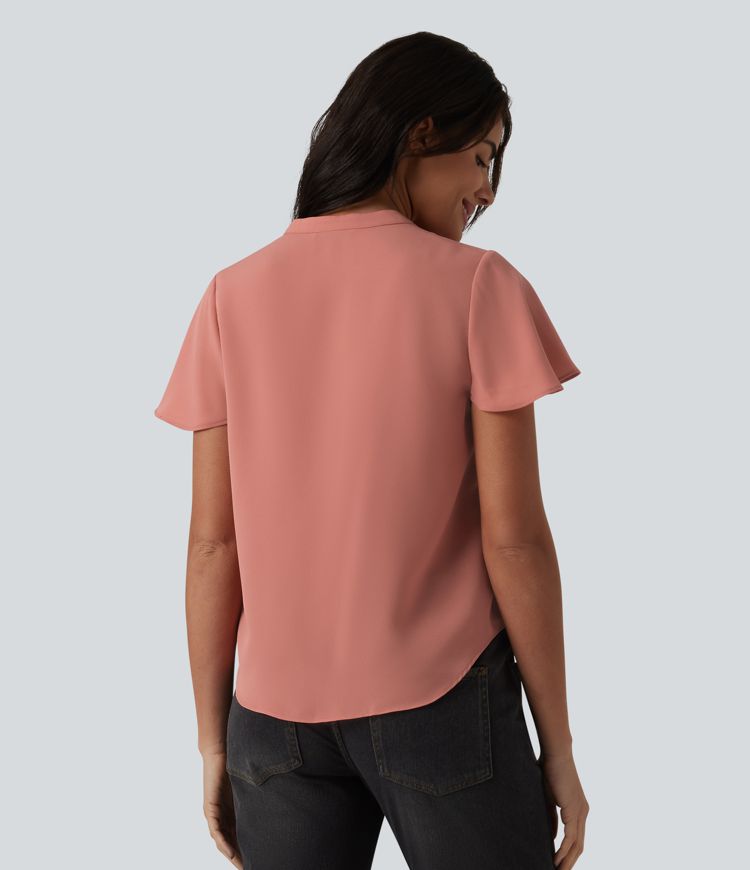 Casual blouse with a V-neck, flounced sleeves and a rounded hem.