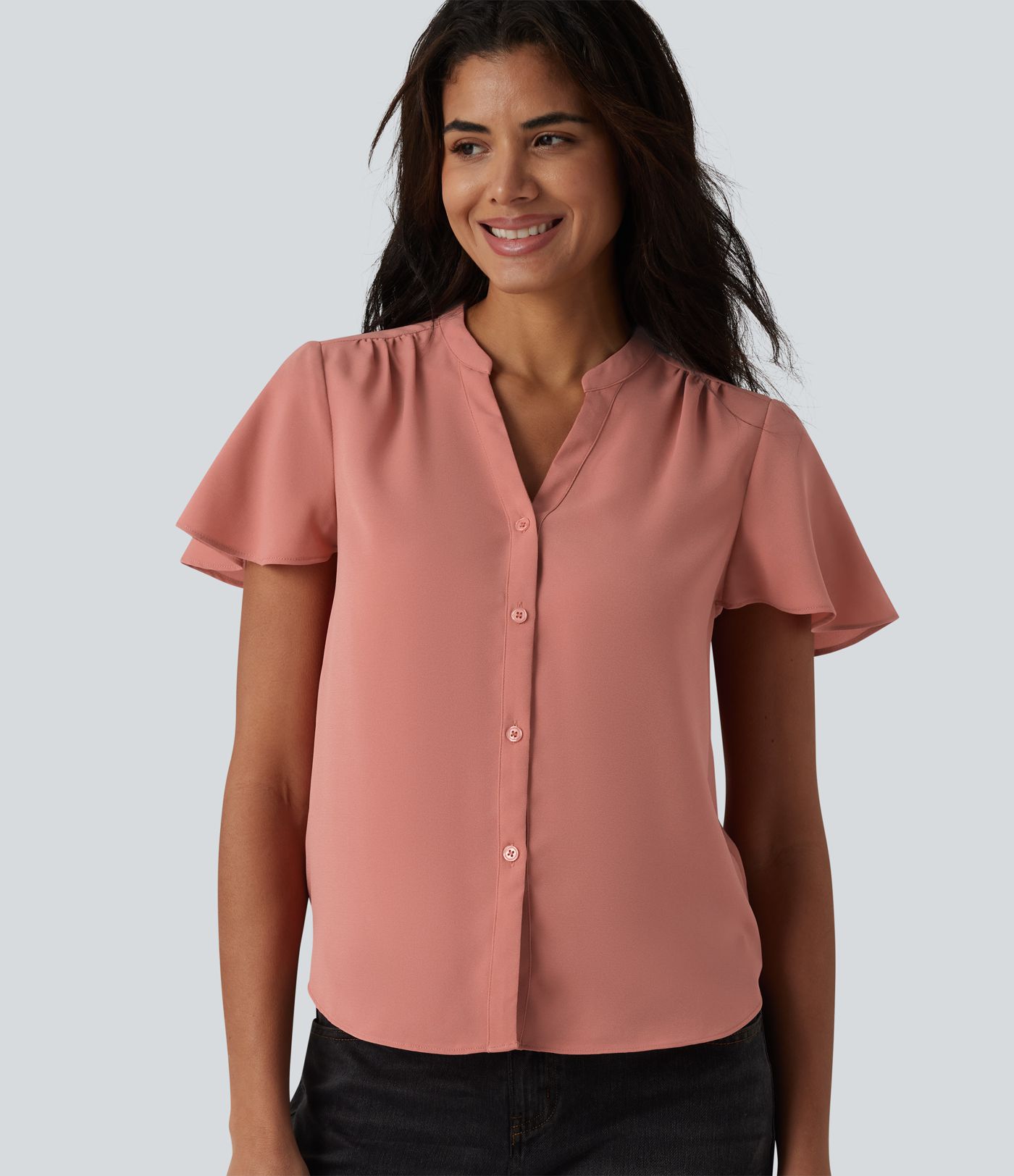 Casual blouse with a V-neck, flounced sleeves and a rounded hem.