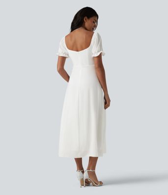 Robe de demoiselle d'honneur et d'invitée de mariage en mousseline fendue col Reine Anne manches bouffantes longueur midi