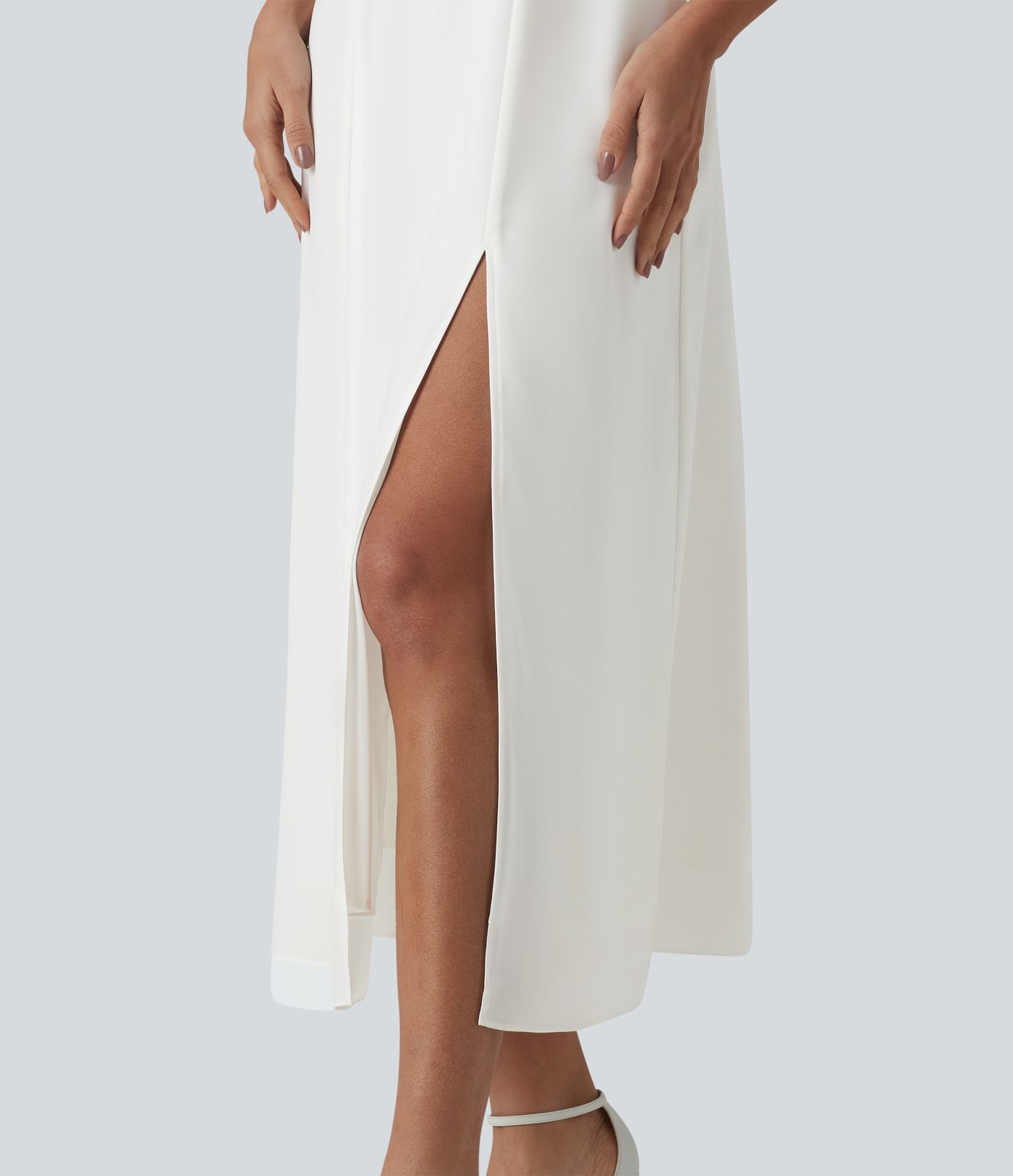 Robe de demoiselle d'honneur et d'invitée de mariage en mousseline fendue col Reine Anne manches bouffantes longueur midi