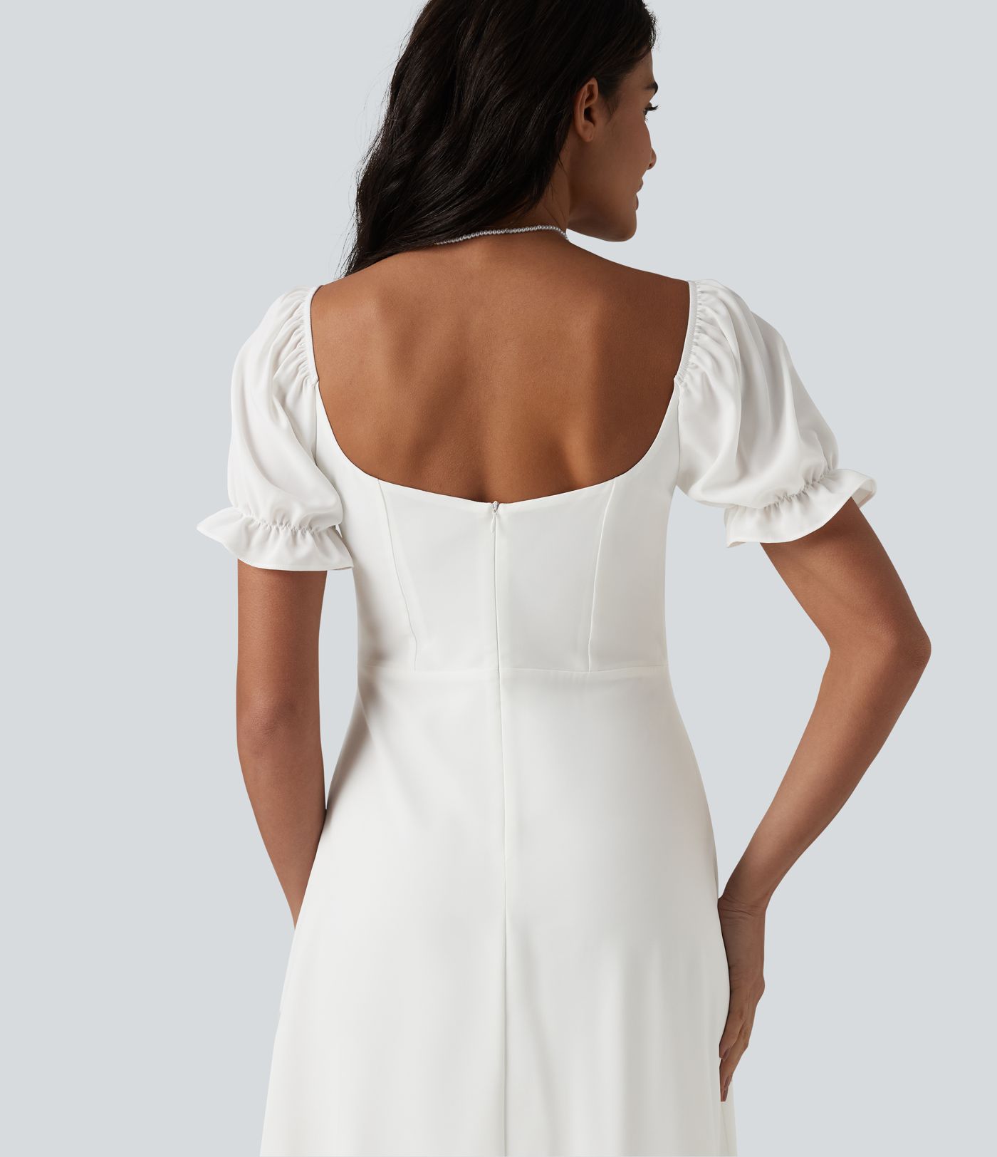 Robe de demoiselle d'honneur et d'invitée de mariage en mousseline fendue col Reine Anne manches bouffantes longueur midi