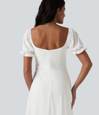 Robe de demoiselle d'honneur et d'invitée de mariage en mousseline fendue col Reine Anne manches bouffantes longueur midi