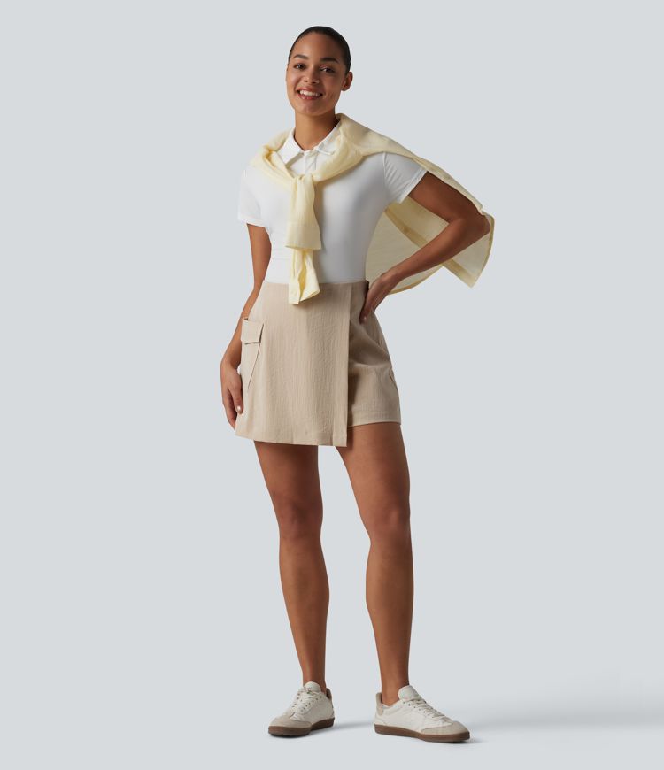 Neformální sukňové šortky (skort) s vysokým pasem, skrytým zipem, lněným vzhledem a kapsou