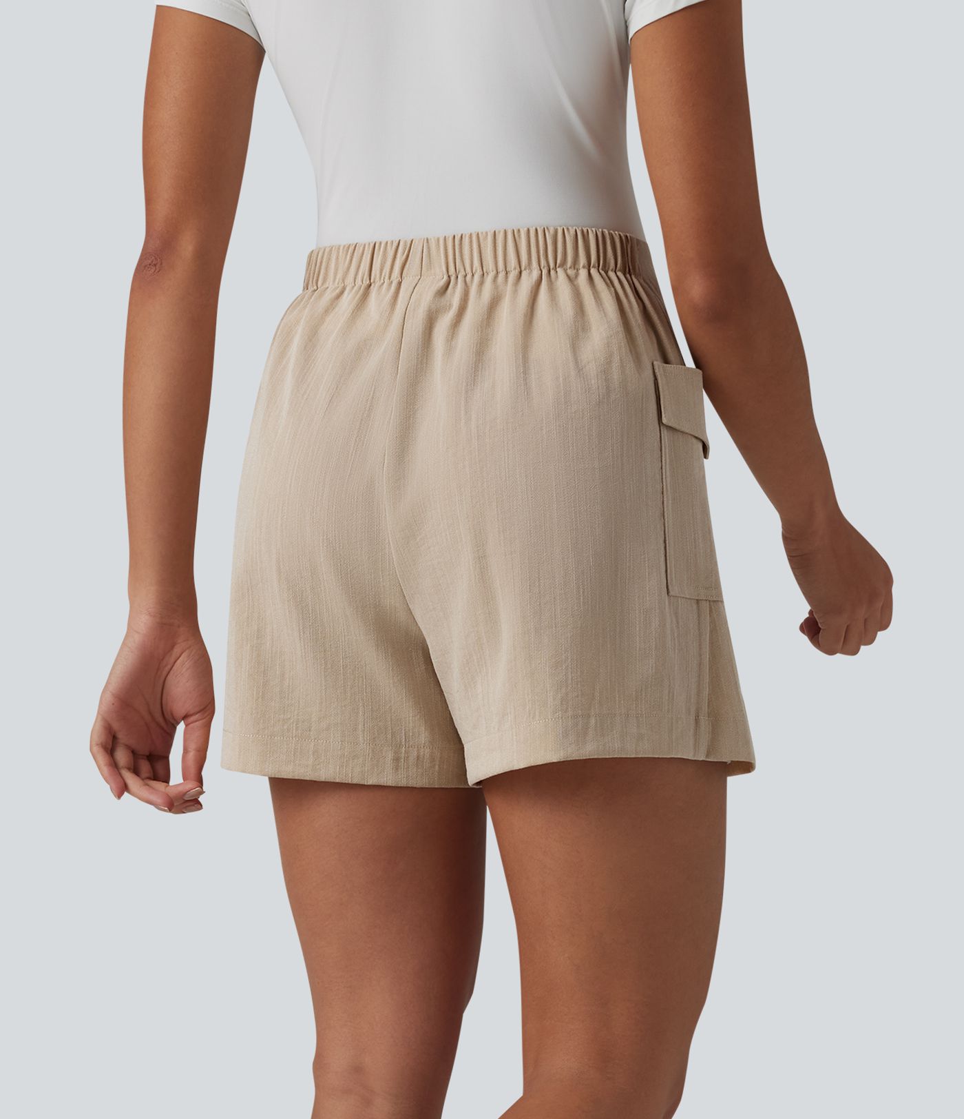 Neformální sukňové šortky (skort) s vysokým pasem, skrytým zipem, lněným vzhledem a kapsou