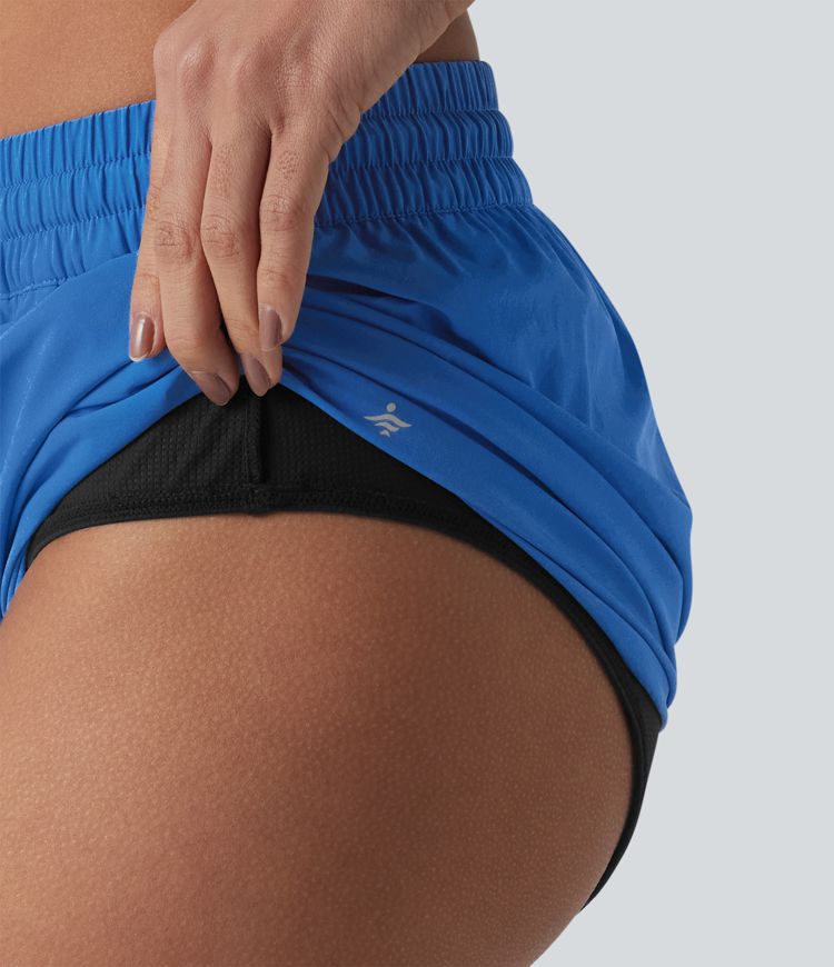 Breezeful™ - Lauf-Shorts mit mittelhohem Bund, mehreren Taschen, Kordelzug, integrierter Unterwäsche und abgerundetem Saum - schnelltrocknend
