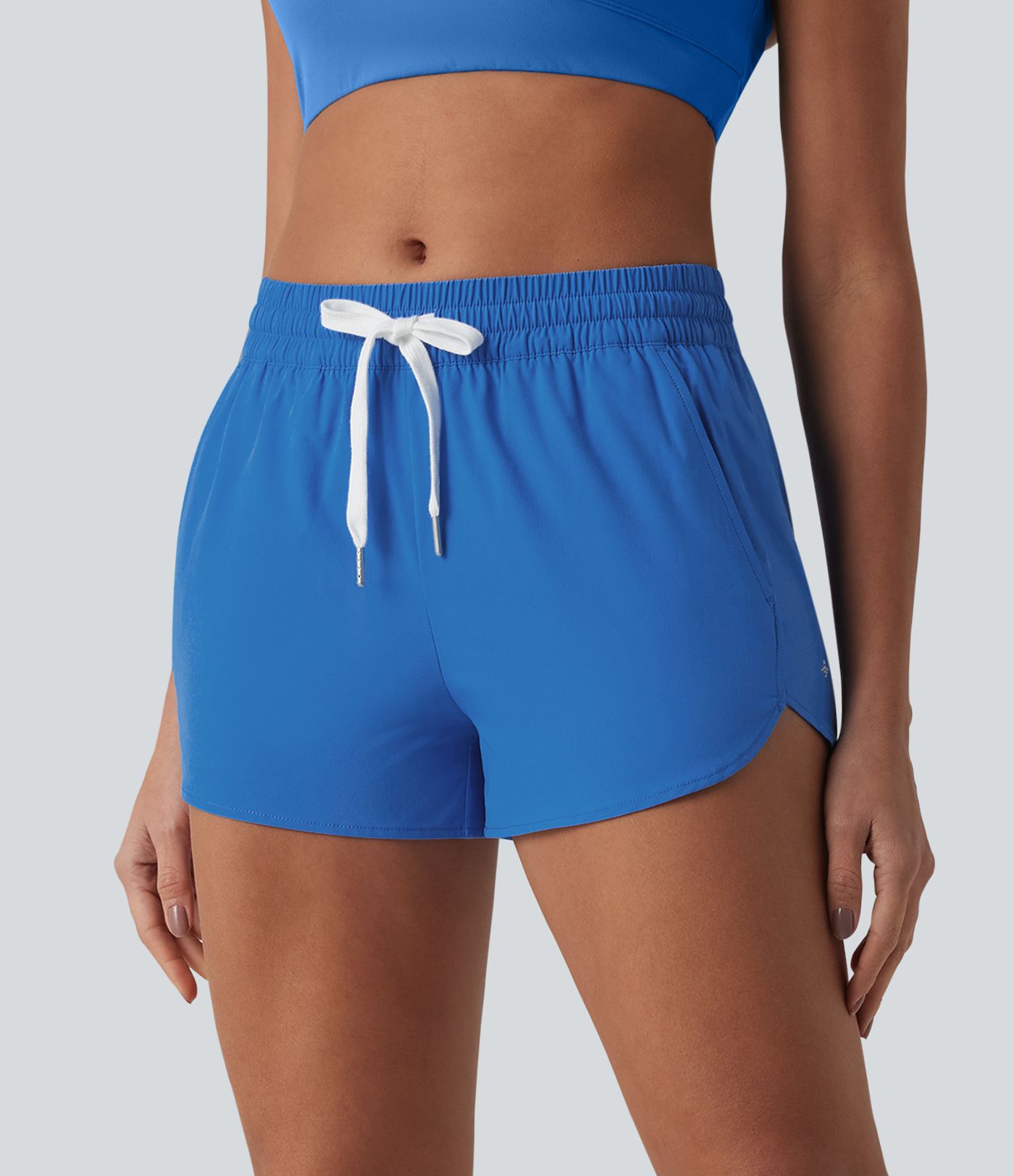 Breezeful™ - Lauf-Shorts mit mittelhohem Bund, mehreren Taschen, Kordelzug, integrierter Unterwäsche und abgerundetem Saum - schnelltrocknend