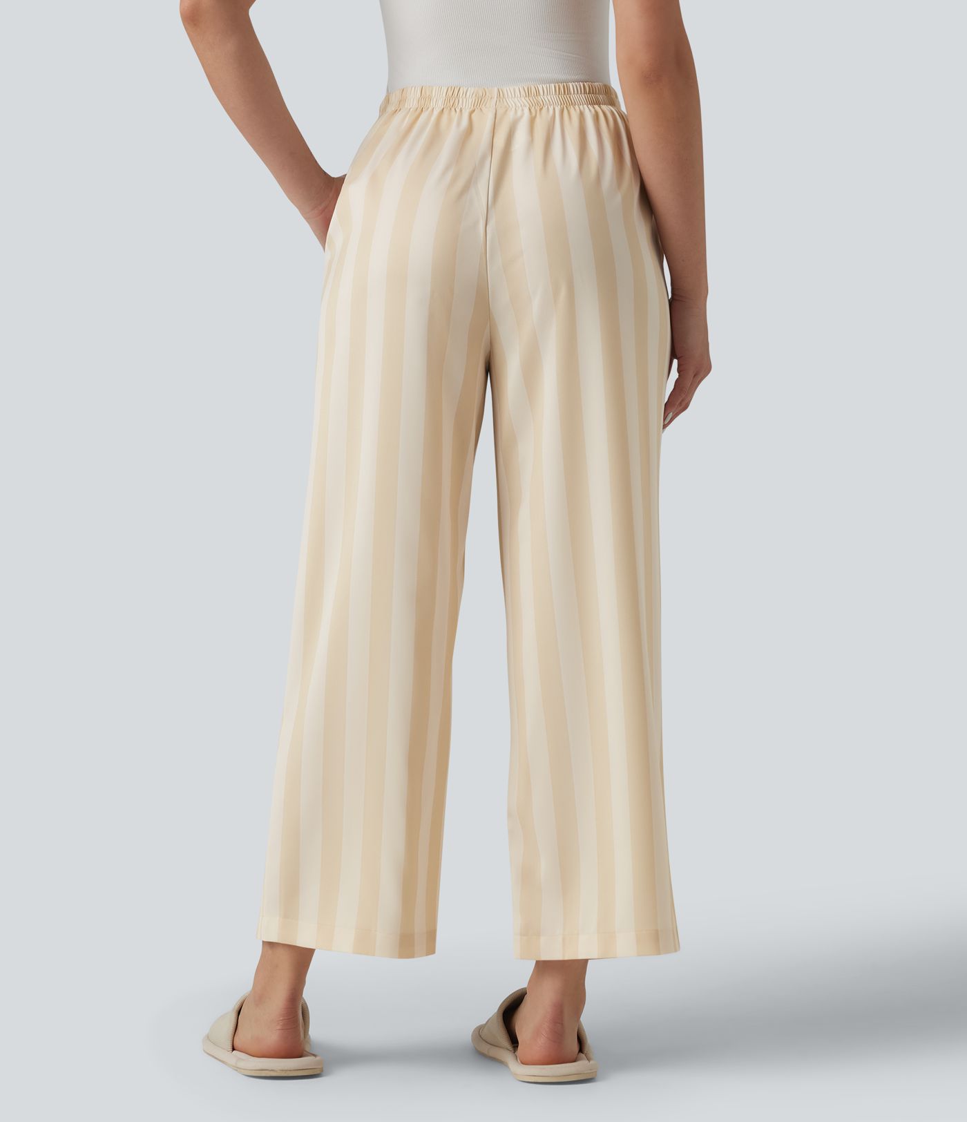 Lounge trousers with a high waist, side pockets, stripes and a straight leg